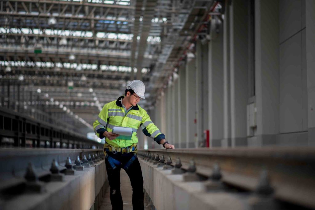 Engineer inspects a rail site